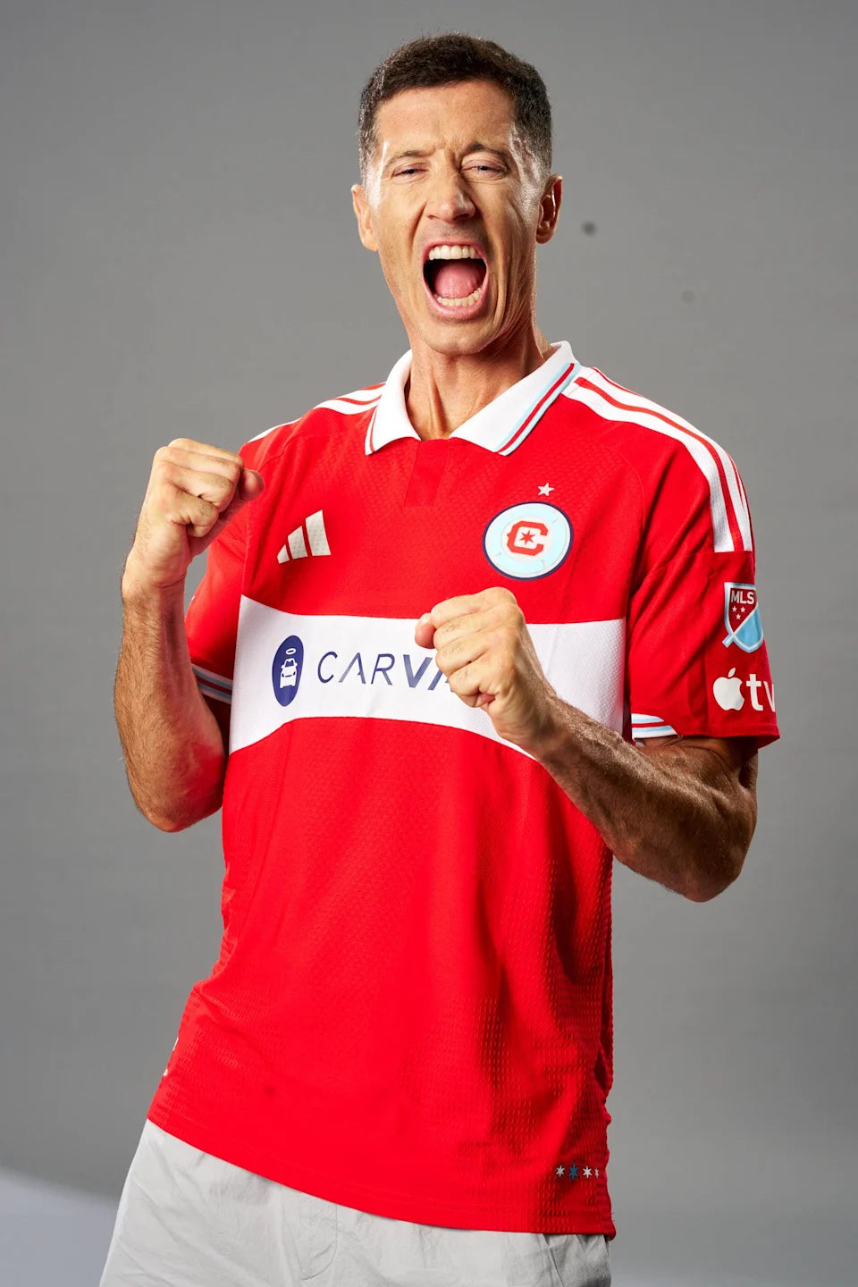 Robert Lewandowski wearing Chicago Fire Shirt